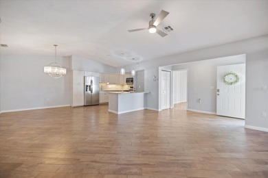 Step inside to discover a masterfully reimagined villa where on IMG Academies Golf and Country Club in Florida - for sale on GolfHomes.com, golf home, golf lot