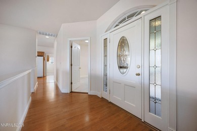 Discover this bright and inviting single-story home tucked along on Silver Oak Golf Course in Nevada - for sale on GolfHomes.com, golf home, golf lot