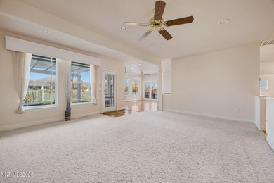 Discover this bright and inviting single-story home tucked along on Silver Oak Golf Course in Nevada - for sale on GolfHomes.com, golf home, golf lot