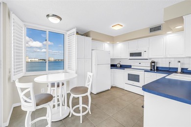 You'll feel instantly at home the moment you step into this on Isla Del Sol Yacht and Country Club in Florida - for sale on GolfHomes.com, golf home, golf lot