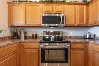 Well-appointed 2-bedroom, 2-bath condo located in desirable on Ledgestone Country Club and Golf Course in Missouri - for sale on GolfHomes.com, golf home, golf lot