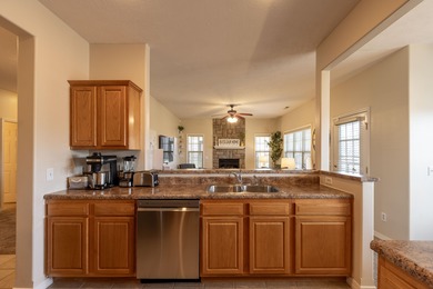 Well-appointed 2-bedroom, 2-bath condo located in desirable on Ledgestone Country Club and Golf Course in Missouri - for sale on GolfHomes.com, golf home, golf lot