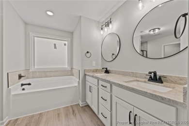 Charming Golf Course Home in Deercroft - Comfort, Space, and on Deercroft Golf and Country Club in North Carolina - for sale on GolfHomes.com, golf home, golf lot