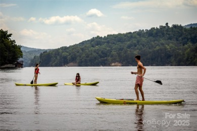 This rare and easily buildable mountain lot sits on the scenic on Rumbling Bald Resort on Lake Lure in North Carolina - for sale on GolfHomes.com, golf home, golf lot