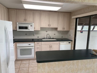 THIS PROPEETY NEEDS UPDATING AND IS BEING SOLD *AS IS*. THE on The Meadows Golf and Country Club in Florida - for sale on GolfHomes.com, golf home, golf lot