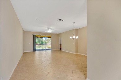 Former Model home.  With a Life in VALENCIA LAKES, one of on Caloosa Greens Executive Golf Course in Florida - for sale on GolfHomes.com, golf home, golf lot