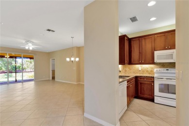 Former Model home.  With a Life in VALENCIA LAKES, one of on Caloosa Greens Executive Golf Course in Florida - for sale on GolfHomes.com, golf home, golf lot