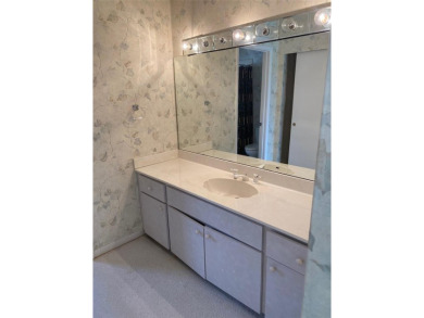 THIS PROPEETY NEEDS UPDATING AND IS BEING SOLD *AS IS*. THE on The Meadows Golf and Country Club in Florida - for sale on GolfHomes.com, golf home, golf lot