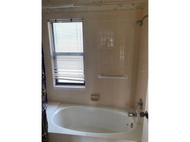 THIS PROPEETY NEEDS UPDATING AND IS BEING SOLD *AS IS*. THE on The Meadows Golf and Country Club in Florida - for sale on GolfHomes.com, golf home, golf lot