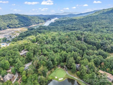 This rare and easily buildable mountain lot sits on the scenic on Rumbling Bald Resort on Lake Lure in North Carolina - for sale on GolfHomes.com, golf home, golf lot