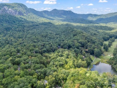 This rare and easily buildable mountain lot sits on the scenic on Rumbling Bald Resort on Lake Lure in North Carolina - for sale on GolfHomes.com, golf home, golf lot