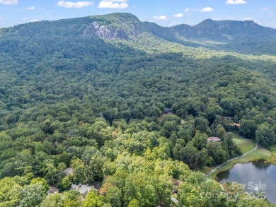 This rare and easily buildable mountain lot sits on the scenic on Rumbling Bald Resort on Lake Lure in North Carolina - for sale on GolfHomes.com, golf home, golf lot