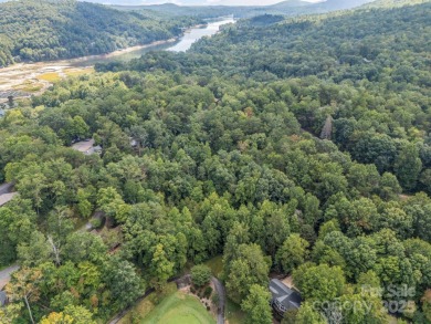 This rare and easily buildable mountain lot sits on the scenic on Rumbling Bald Resort on Lake Lure in North Carolina - for sale on GolfHomes.com, golf home, golf lot