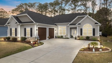 Discover coastal elegance nestled in the tranquil Windsong on Cypress Bay Golf Club in South Carolina - for sale on GolfHomes.com, golf home, golf lot