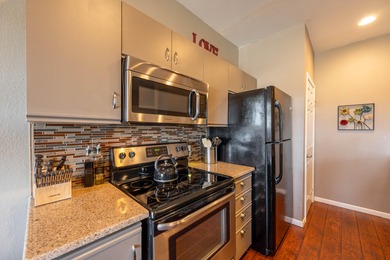 Fully furnished 2-bedroom, 2-bath condo located in sought-after on Holiday Hills Resort and Golf in Missouri - for sale on GolfHomes.com, golf home, golf lot