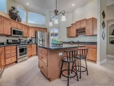 LOVELY CUSTOM ST. SIMON PREMIER home on LARGE CORNER LOT in on Palmer Legends Country Club in Florida - for sale on GolfHomes.com, golf home, golf lot