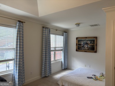 Enjoy life in this beautiful all-brick, low maintenance home in on Jennings Mill Country Club in Georgia - for sale on GolfHomes.com, golf home, golf lot