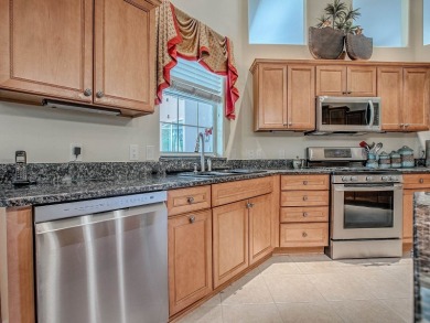 LOVELY CUSTOM ST. SIMON PREMIER home on LARGE CORNER LOT in on Palmer Legends Country Club in Florida - for sale on GolfHomes.com, golf home, golf lot