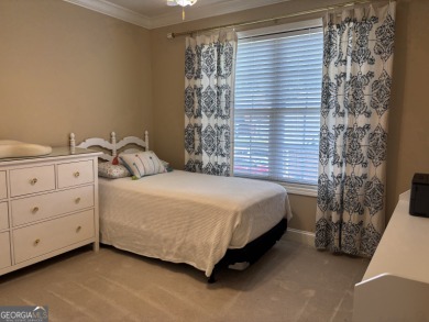 Enjoy life in this beautiful all-brick, low maintenance home in on Jennings Mill Country Club in Georgia - for sale on GolfHomes.com, golf home, golf lot