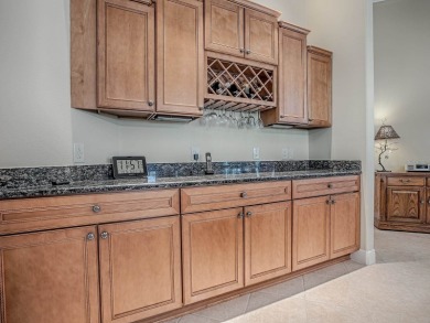 LOVELY CUSTOM ST. SIMON PREMIER home on LARGE CORNER LOT in on Palmer Legends Country Club in Florida - for sale on GolfHomes.com, golf home, golf lot