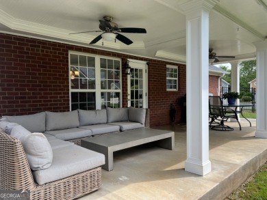 Enjoy life in this beautiful all-brick, low maintenance home in on Jennings Mill Country Club in Georgia - for sale on GolfHomes.com, golf home, golf lot