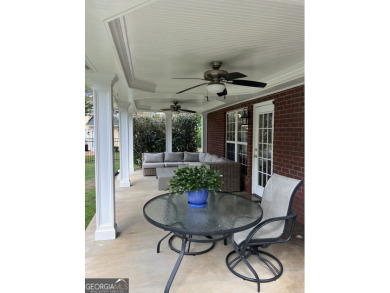 Enjoy life in this beautiful all-brick, low maintenance home in on Jennings Mill Country Club in Georgia - for sale on GolfHomes.com, golf home, golf lot
