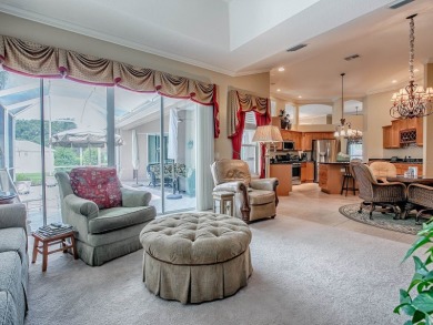 LOVELY CUSTOM ST. SIMON PREMIER home on LARGE CORNER LOT in on Palmer Legends Country Club in Florida - for sale on GolfHomes.com, golf home, golf lot