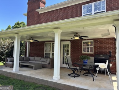 Enjoy life in this beautiful all-brick, low maintenance home in on Jennings Mill Country Club in Georgia - for sale on GolfHomes.com, golf home, golf lot