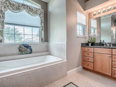 LOVELY CUSTOM ST. SIMON PREMIER home on LARGE CORNER LOT in on Palmer Legends Country Club in Florida - for sale on GolfHomes.com, golf home, golf lot