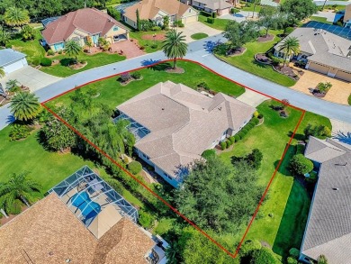 LOVELY CUSTOM ST. SIMON PREMIER home on LARGE CORNER LOT in on Palmer Legends Country Club in Florida - for sale on GolfHomes.com, golf home, golf lot