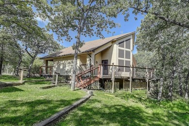 Discover the charm of this unique Ralph Lauren Cottage-inspired on Nocona Hills Golf Course in Texas - for sale on GolfHomes.com, golf home, golf lot