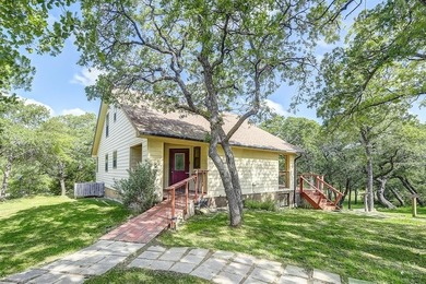 Discover the charm of this unique Ralph Lauren Cottage-inspired on Nocona Hills Golf Course in Texas - for sale on GolfHomes.com, golf home, golf lot