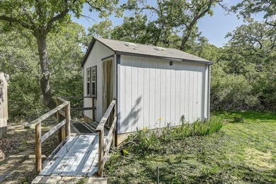 Discover the charm of this unique Ralph Lauren Cottage-inspired on Nocona Hills Golf Course in Texas - for sale on GolfHomes.com, golf home, golf lot