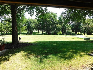 Enjoy golf course living in this spacious 2-story end-unit condo on Lake Forest Golf and Country Club in Missouri - for sale on GolfHomes.com, golf home, golf lot