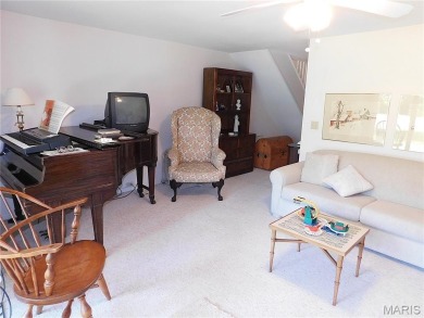 Enjoy golf course living in this spacious 2-story end-unit condo on Lake Forest Golf and Country Club in Missouri - for sale on GolfHomes.com, golf home, golf lot