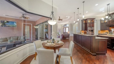 Discover a slice of paradise in the gated community of Lakewood on Ritz-Carlton Members Golf Club in Florida - for sale on GolfHomes.com, golf home, golf lot