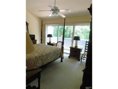 Enjoy golf course living in this spacious 2-story end-unit condo on Lake Forest Golf and Country Club in Missouri - for sale on GolfHomes.com, golf home, golf lot