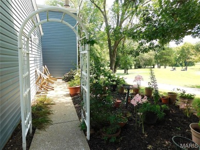 Enjoy golf course living in this spacious 2-story end-unit condo on Lake Forest Golf and Country Club in Missouri - for sale on GolfHomes.com, golf home, golf lot