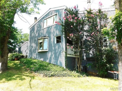 Enjoy golf course living in this spacious 2-story end-unit condo on Lake Forest Golf and Country Club in Missouri - for sale on GolfHomes.com, golf home, golf lot
