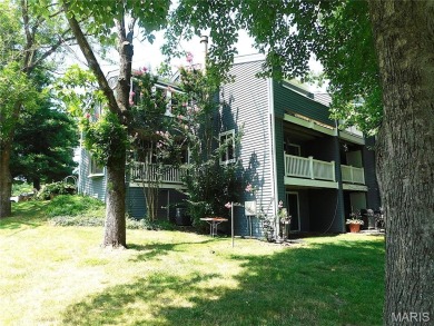 Enjoy golf course living in this spacious 2-story end-unit condo on Lake Forest Golf and Country Club in Missouri - for sale on GolfHomes.com, golf home, golf lot