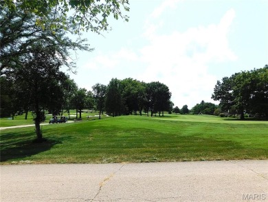 Enjoy golf course living in this spacious 2-story end-unit condo on Lake Forest Golf and Country Club in Missouri - for sale on GolfHomes.com, golf home, golf lot