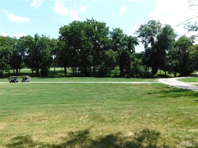 Enjoy golf course living in this spacious 2-story end-unit condo on Lake Forest Golf and Country Club in Missouri - for sale on GolfHomes.com, golf home, golf lot