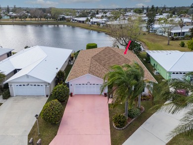Gorgeously remodeled lakefront home with over $84,000 in on Spanish Lakes Fairways in Florida - for sale on GolfHomes.com, golf home, golf lot