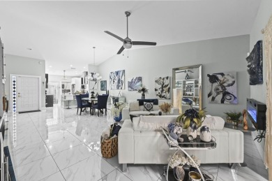 Experience  Florida lifestyle in this beautifully maintained on Deer Creek Golf Club in Florida - for sale on GolfHomes.com, golf home, golf lot