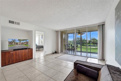 This charming 2-bedroom, 2-bathroom condo offers the perfect on Pine Island Ridge Country Club in Florida - for sale on GolfHomes.com, golf home, golf lot