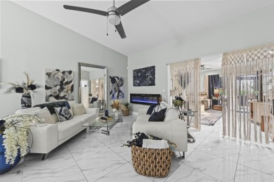 Experience  Florida lifestyle in this beautifully maintained on Deer Creek Golf Club in Florida - for sale on GolfHomes.com, golf home, golf lot