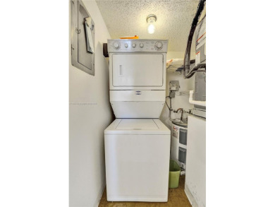 This charming 2-bedroom, 2-bathroom condo offers the perfect on Pine Island Ridge Country Club in Florida - for sale on GolfHomes.com, golf home, golf lot