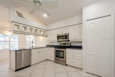 FABULOUS HOME ON GOLF COURSE ~ Move-In-Ready! This lovely on Meadow Oaks Golf and Country Club in Florida - for sale on GolfHomes.com, golf home, golf lot