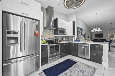 Experience  Florida lifestyle in this beautifully maintained on Deer Creek Golf Club in Florida - for sale on GolfHomes.com, golf home, golf lot