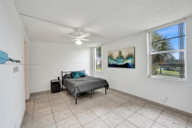 This charming 2-bedroom, 2-bathroom condo offers the perfect on Pine Island Ridge Country Club in Florida - for sale on GolfHomes.com, golf home, golf lot